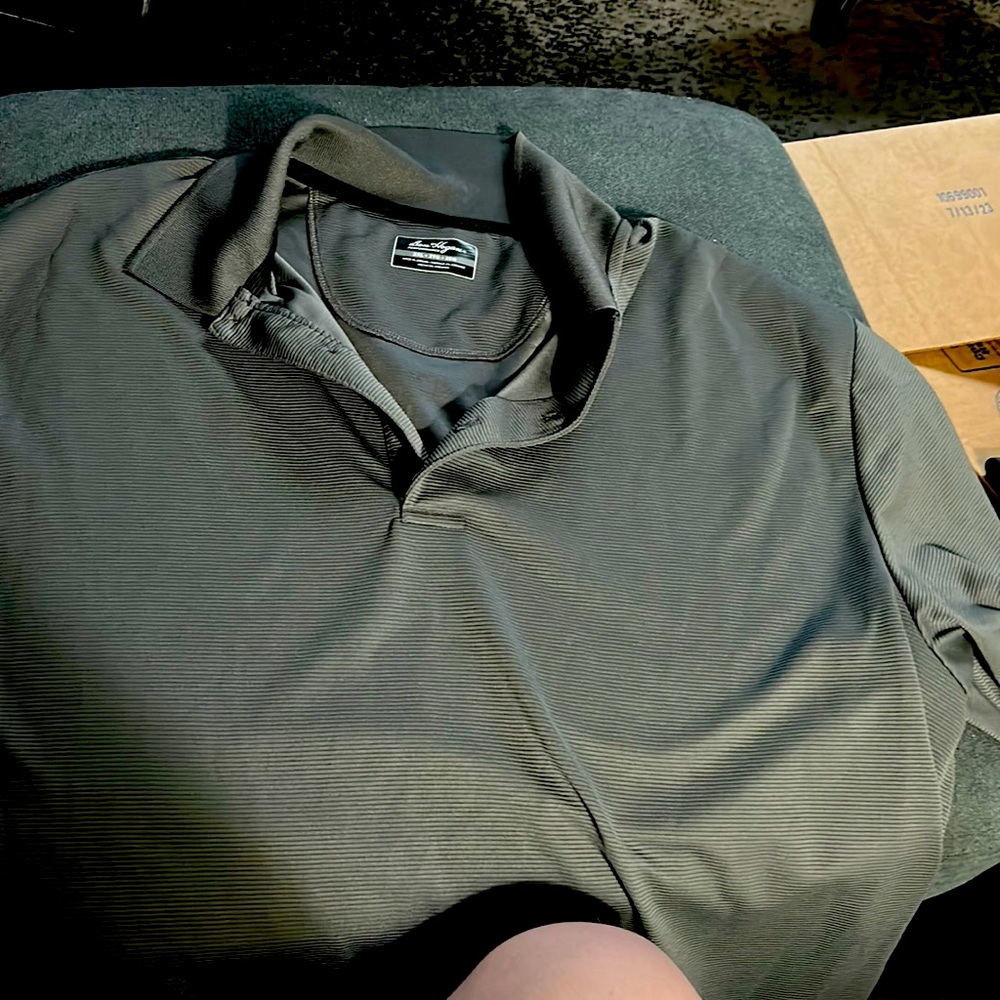 New but no tags never worn paid $25 for it. make an offer.Ben hogan golf shirt